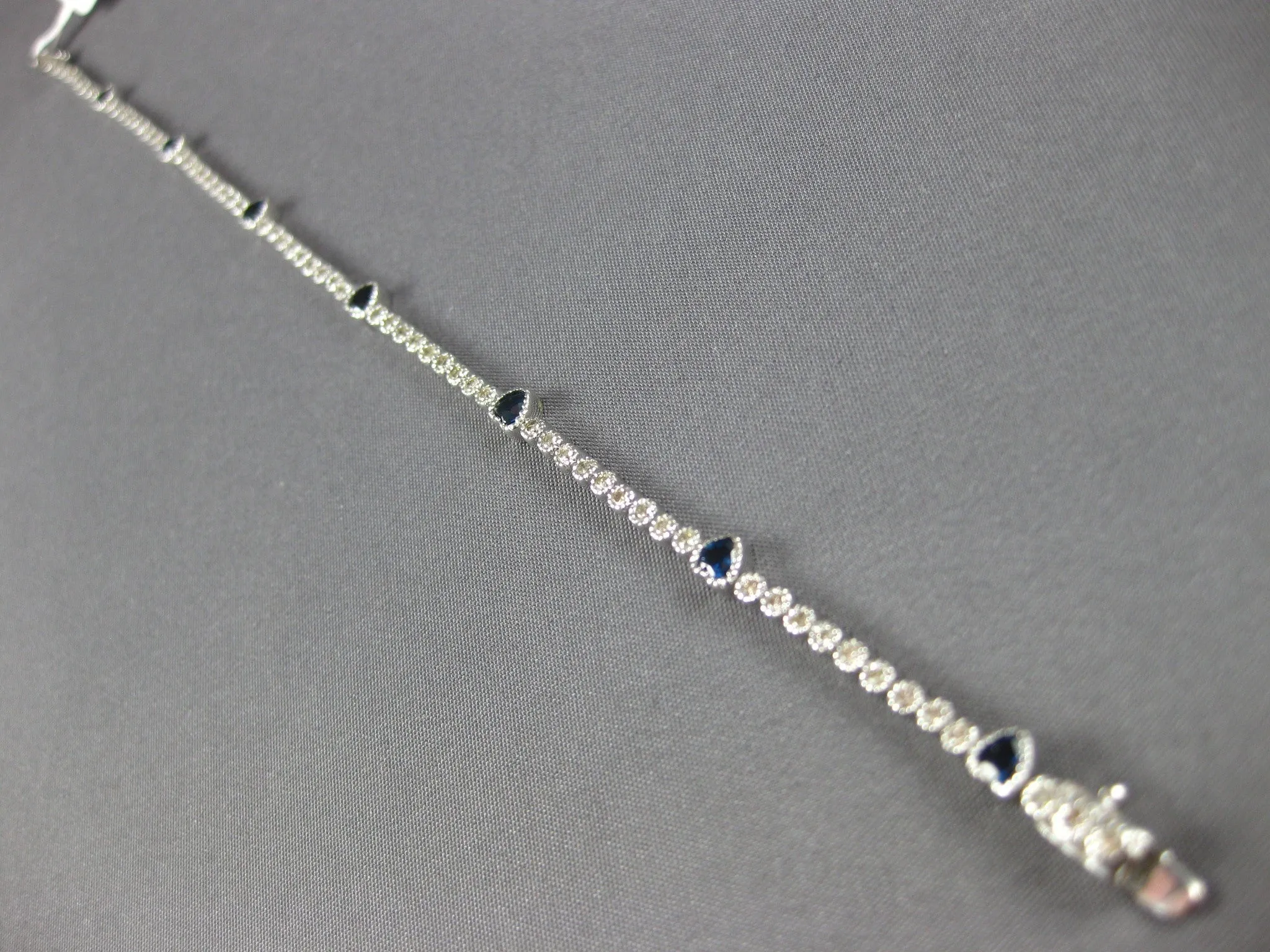 ESTATE 1.96CT DIAMOND & AAA SAPPHIRE 18KT WHITE GOLD MULTI HEART TENNIS BRACELET